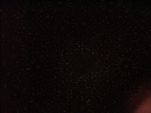 There's an area in the centre of the picture more black than the rest: there's the way up to Allah